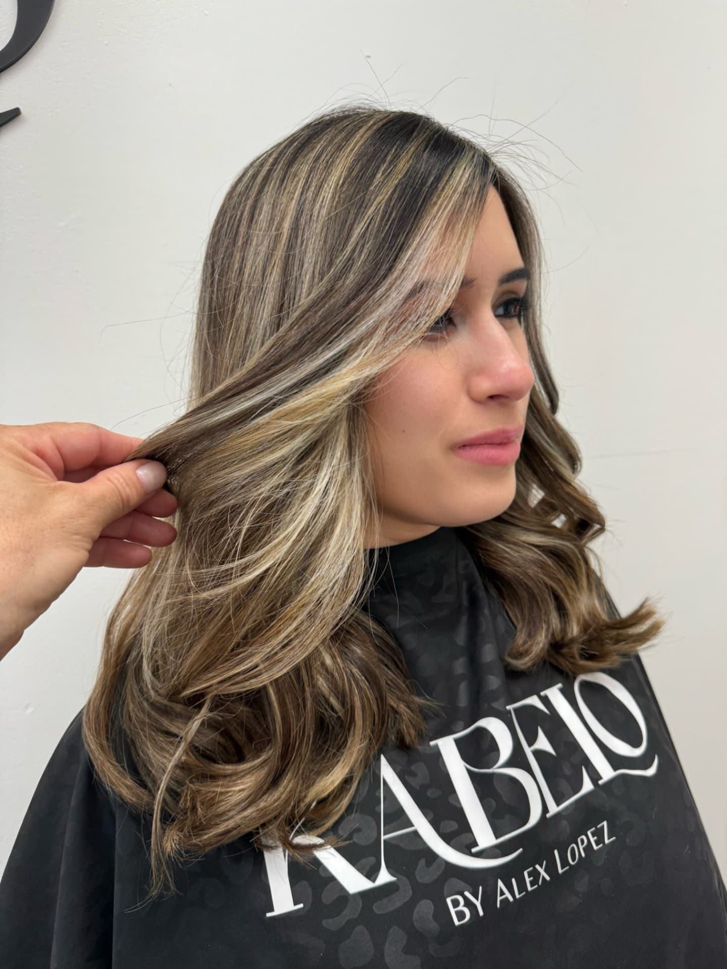 Rich brunette with bright face-framing highlights