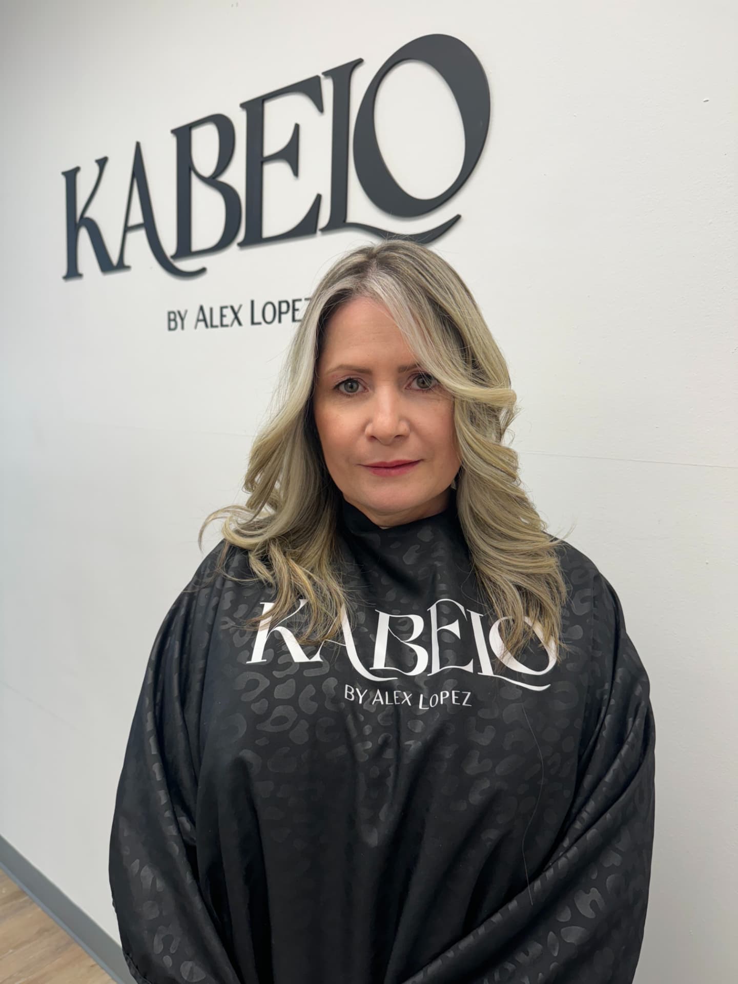 Ash blonde lob with soft curtain bangs